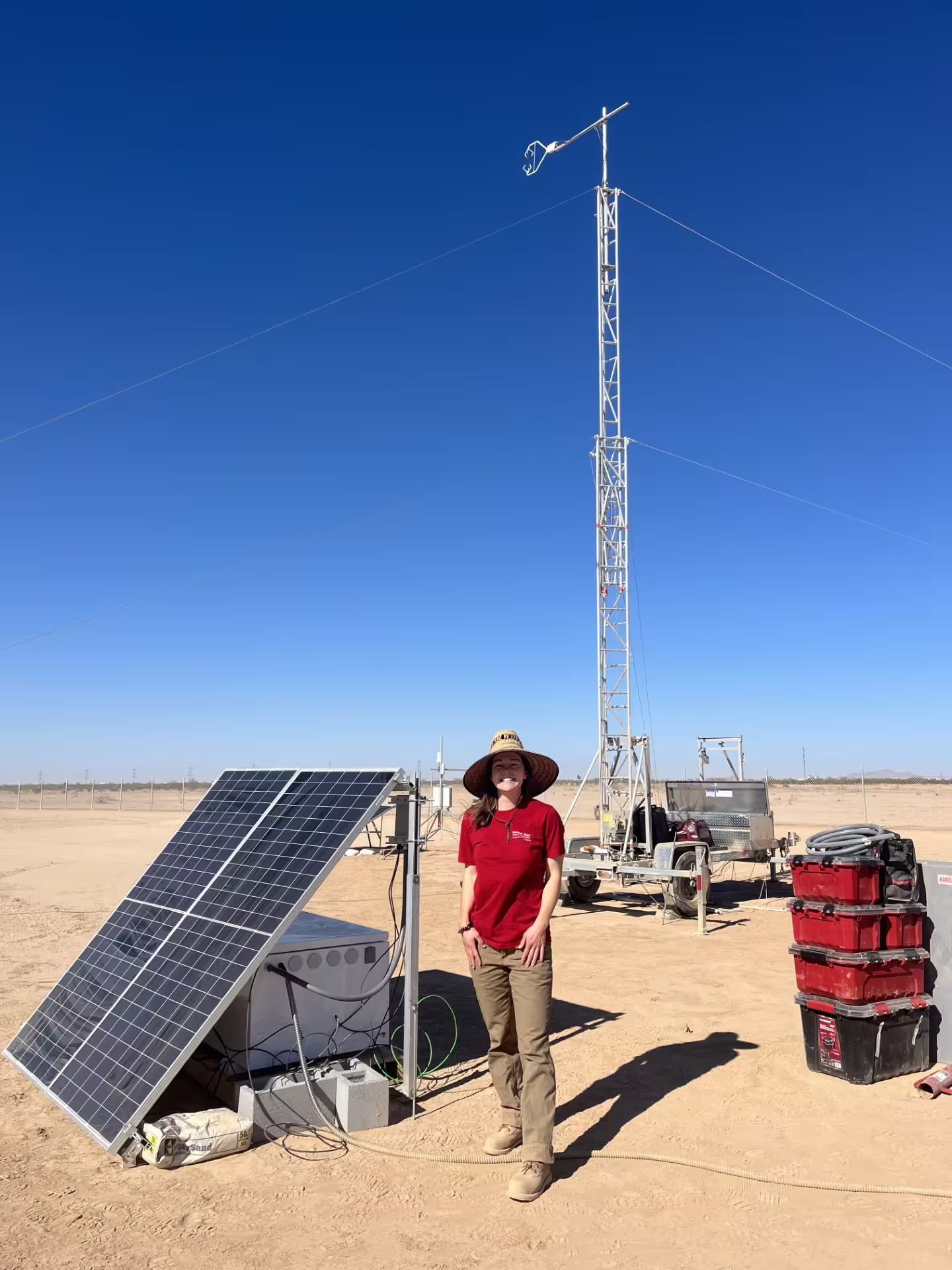 Researcher at desert test site with equipment